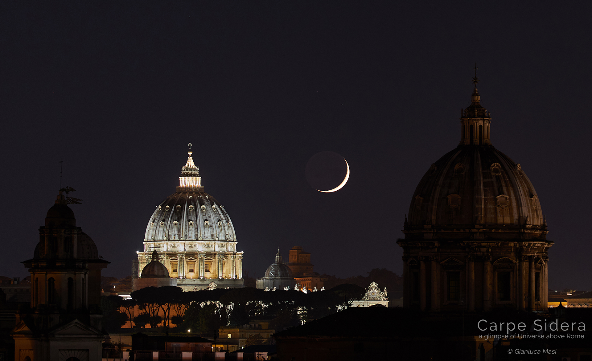 A sharp Moon crescent sets behind St. Peter's Dome in Rome