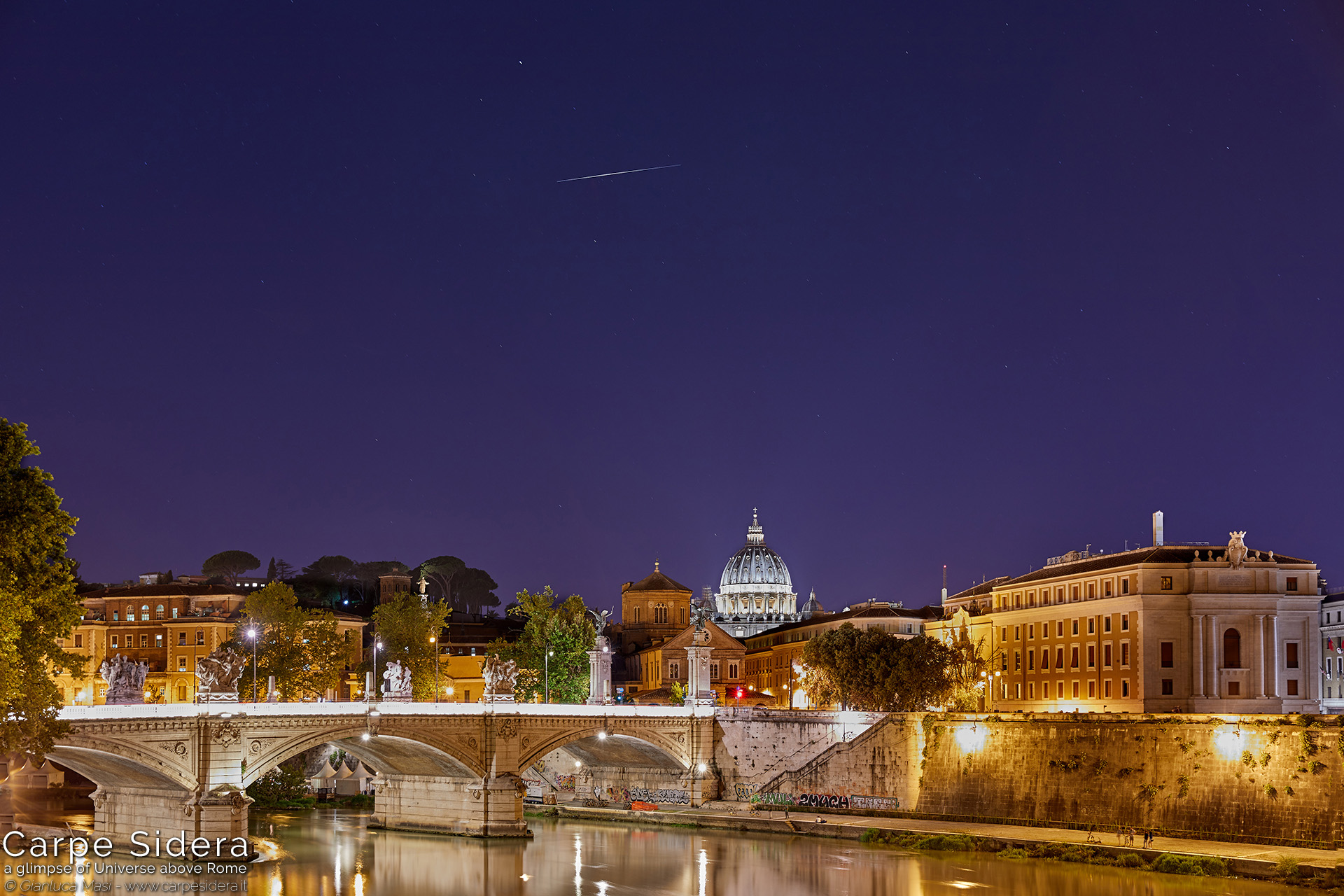 11. The Iridium 10 satellite shines above the Tiber and the dome of St. Peter's.