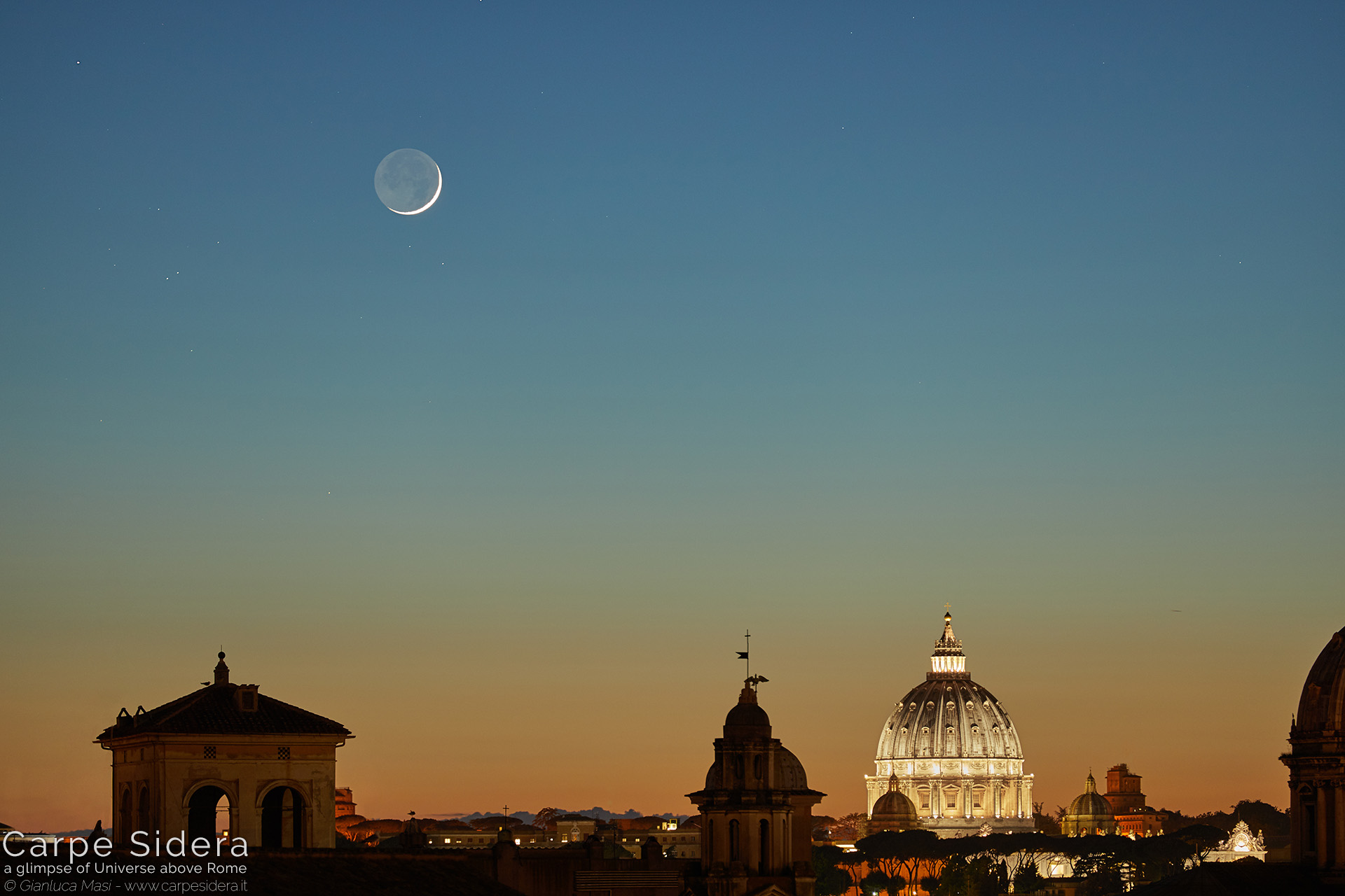 13. Moon crescent and Earthshine at sunset, above the dome of St. Peter's.