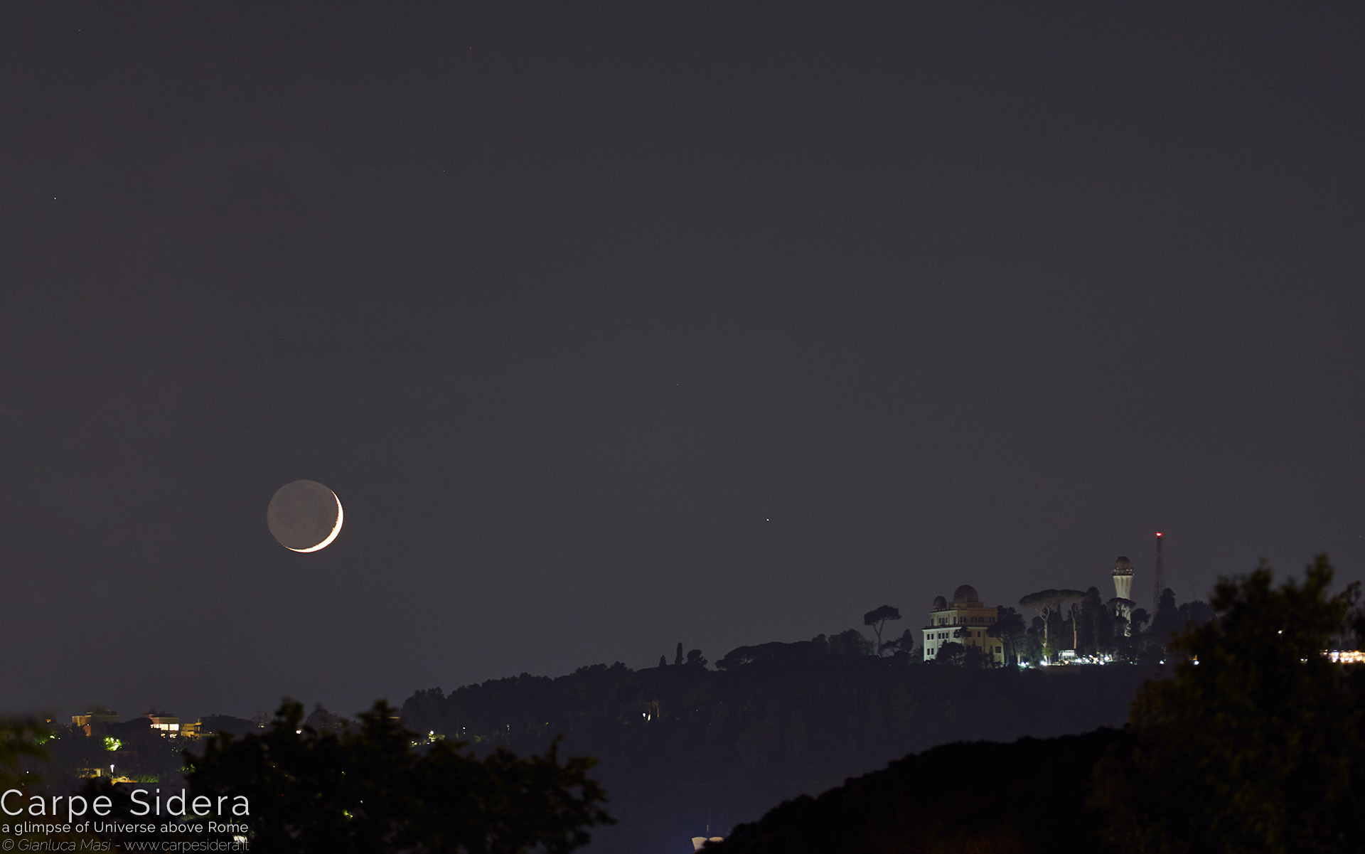 15. The Moon and planet Mars beside the Monte Mario Observatory.