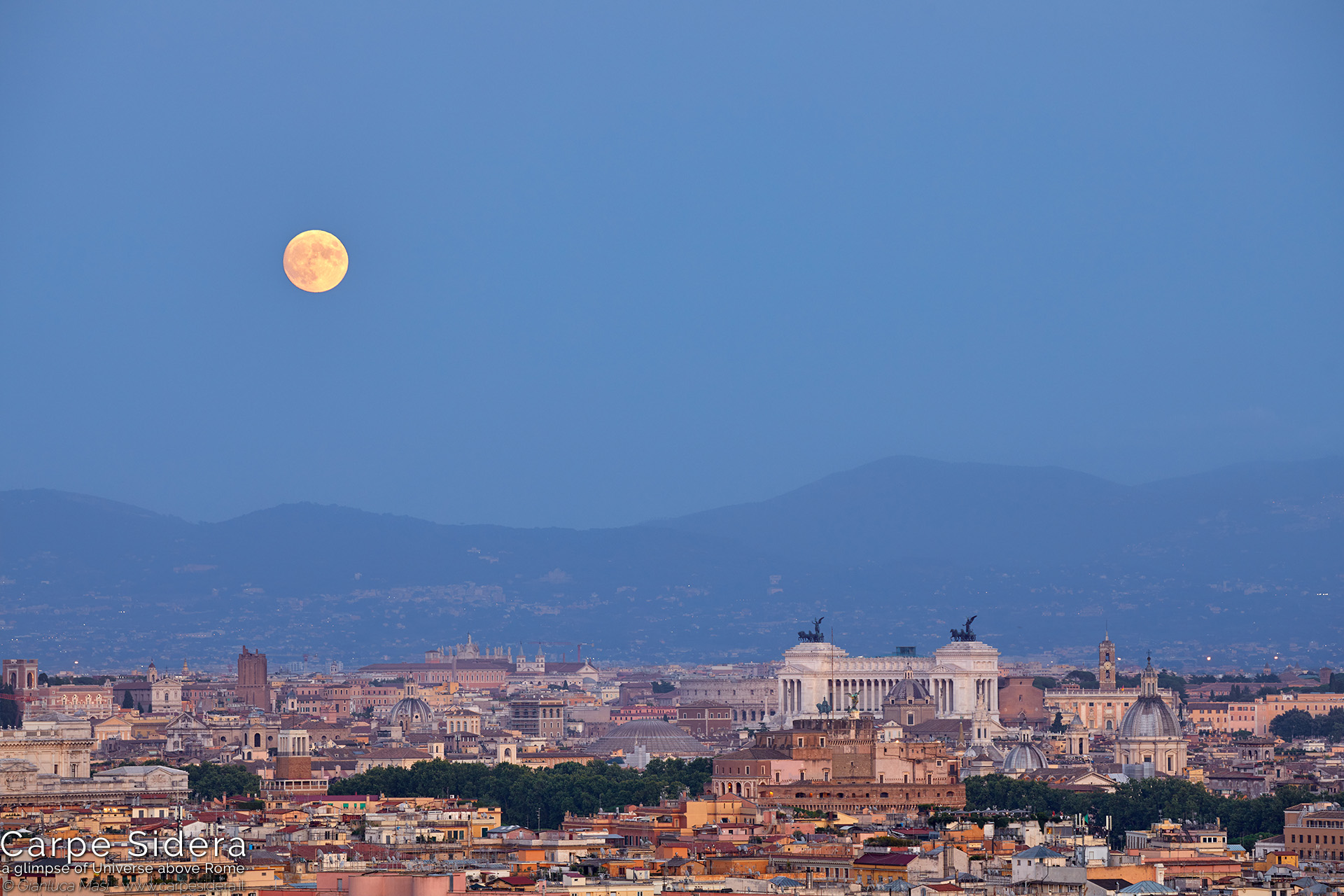 18. The summer full Moon rises above the Eternal City, at sunset.