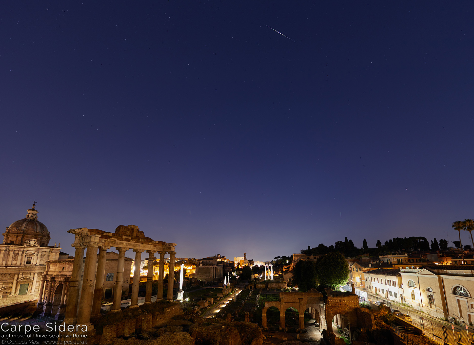 25. The Iridium 45 satellite shines above the Roman Forum.